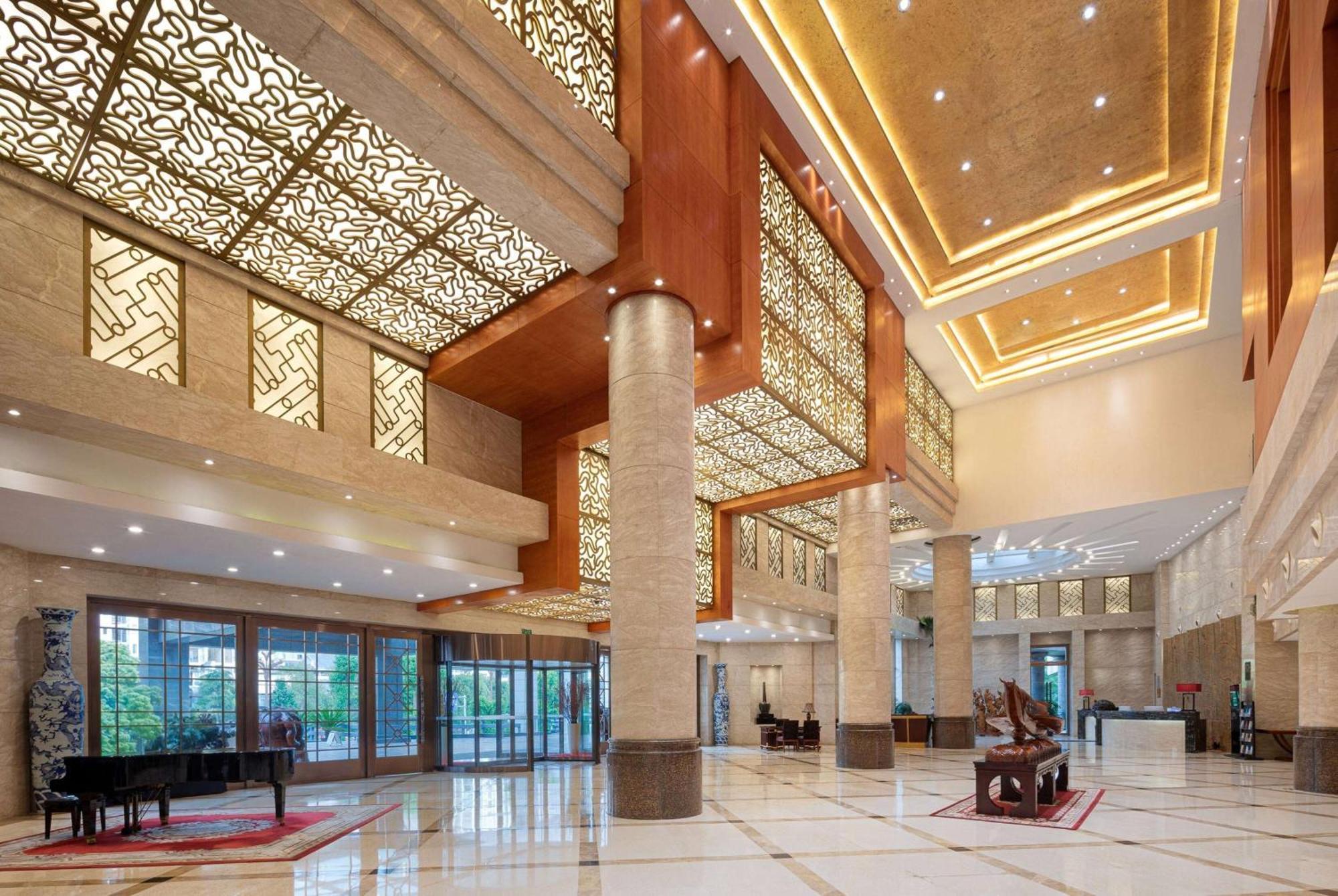 Hotel Ramada Plaza By Wyndham Chongqing West Exterior foto
